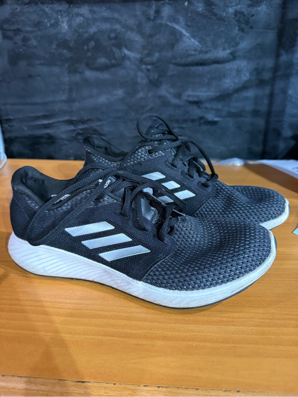 adidas Black womens Athletic Sneakers with White Stripes